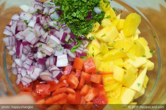 Add all the fresh things into the big bowl.