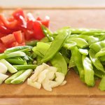 Meanwhile prepare the green onions, red pepper and garlic.
