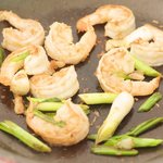 Add another tablespoon of oil to the pan. Add the scallions and stir fry for 30 seconds.