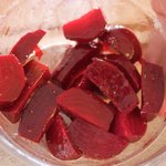 Mix the beet wedges with the remaining 1/2 of the dressing until well coated.