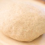 Turn the dough onto a working surface or cutting board, knead it for a few more times.