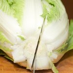 Remove the rough outer leaves (about 2-3 leaves) from each cabbage, set aside. 
