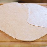 On lightly floured surface, roll out dough to 1/2 inch thickness.
