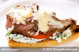 Open-face Flank Steak Sandwiches with Herbed Goat Cheese and Tomatoes