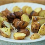 Boil and grill the new potatoes.