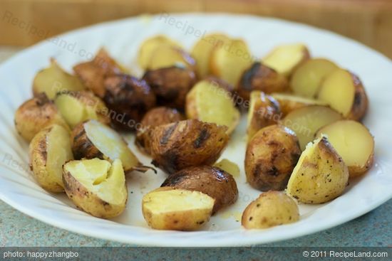 Boil and grill the new potatoes.
