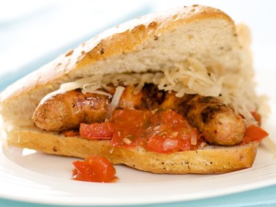 Grilled Sausage Sandwiches with Tomato Jam and Sauerkraut