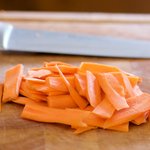 Slice the carrots into thinly slices.