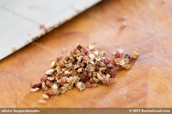 Finely mince or grind Szechuan peppercorns. 