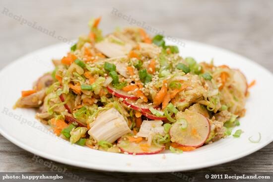 Whisk dressing again and drizzle over the salad, toss to evenly coat.