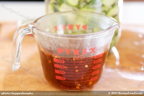 Or you can put it into a measuring cup, then pour from the cup into the jar.