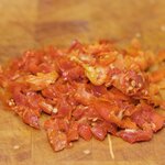 Coarsely chop the sun-dried tomatoes. 