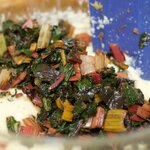 Add the cooked and drained Swiss chard.