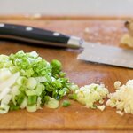 Then slice the scallions, finely chop or mince the garlic and ginger.