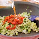 Stir in roasted bell peppers, pour sauce over vegetables.