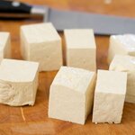 Slice tofu into 1-inch cubes.