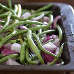 Toss both green beans and onions with olive oil, salt and black pepper on a large baking sheet with tin foil lined up.