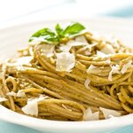 Here we have the pesto pasta on the plate, sprinkle some parmesan on top, and enjoy!