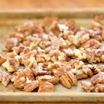 Place the pecans in a single layer on a baking sheet lined with a piece of tin foil.