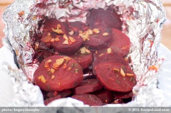 Roast in 400 degrees F oven for 1 hour or until beets are soft.  