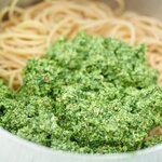 Mix pesto with pasta, adding some boiling pasta water as needed if seems too dry.