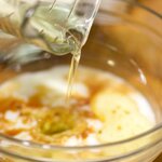 Combine water, oil, vinegar and vanilla in another mixing bowl. 