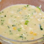 In a medium-size bowl, mix egg, buttermilk, oil, zucchini, corn and green onion.