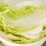 Separate the cabbage leaves, wash and drain well.