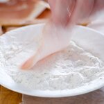 Dredge one side of each cutlet in the flour