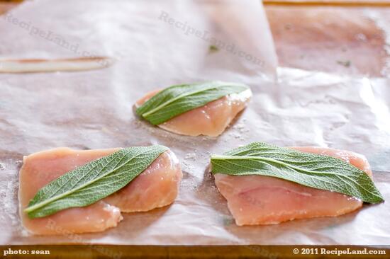 Place sage leaves on each chicken cutlet