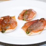 Plating, the cooked chicken saltimbocca