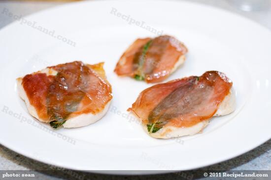 Plating, the cooked chicken saltimbocca