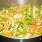 Stir in carrots, celery, zucchini if using, both sweet bell peppers and banana pepper or jalapeno if using, and cook for about 3 to 5 minutes until the vegetables are tender but still crispy.