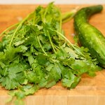 While the vegetables are cooking, get ready the fresh cilantro and cucumber for the final step.