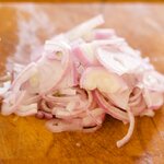 Thinly slice the shallot or red onion.