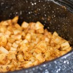 Spread the potato cubes evenly into a baking pan.