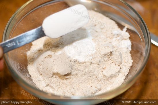 Add the flour and baking powder into a small bowl, 