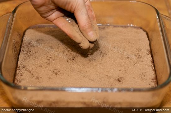 Sprinkle the cocoa-sugar mixture evenly over the batter