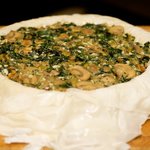 Spoon the filling into the crust and spread it evenly. 