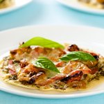 Place onto the serving plates and top with a few fresh basil leaves. 