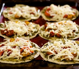 Basil Pesto, Oven-Dried Cherry Tomato and Mozzarella Taco Pizzas