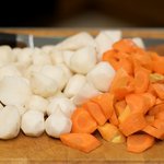 Peel the turnips and carrots, then cut into 1/2-inch cubes.