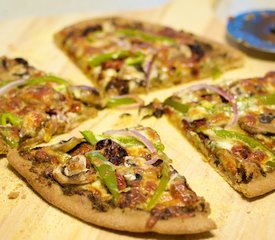 Oven-Dried Heirloom Tomato, Basil Pesto and Mozzarella Pizza