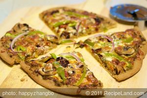 Oven-Dried Heirloom Tomato, Basil Pesto and Mozzarella Pizza