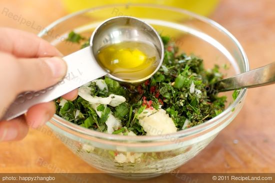 Remove the stems, finely chop all the fresh herbs, red chili peppers, and mince the garlic.