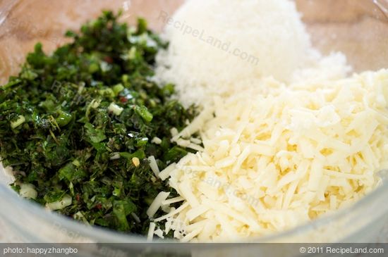 Add the shredded mozzarella cheese, grated parmesan, herb-olive mixture into the flour mixture.