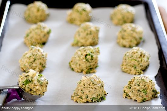 Drop the batter by about 2 tablespoons full onto a large baking sheet lined with parchment paper, 