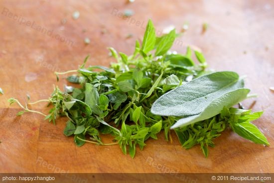 Wash well the fresh herbs, and finely chop them.