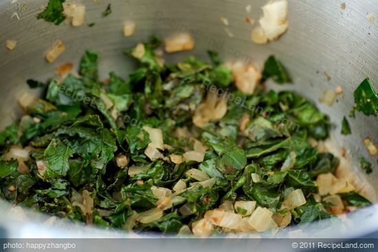 Add the kale into the cooked onions and saute, stirring, cook until wilted about 2 minutes. 