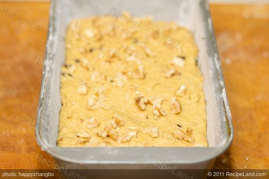Pour the batter into the loaf pan.
